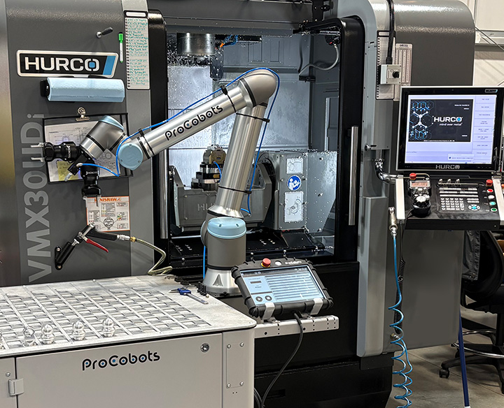 Hurco machine with cobot at work